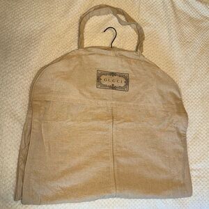 Gucci cloth double snap garment bag with black velvet Gucci hanger